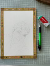 Blank white paper with sketched outlines of a woman's portrait.